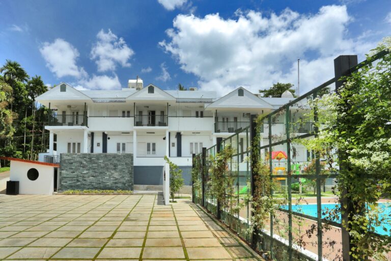 Le Villagio Resort in Wayanad with lush green surroundings
