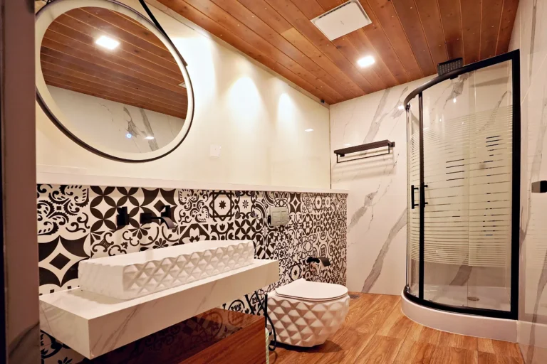 Dome suite bathroom with designer tiles and walk-in shower