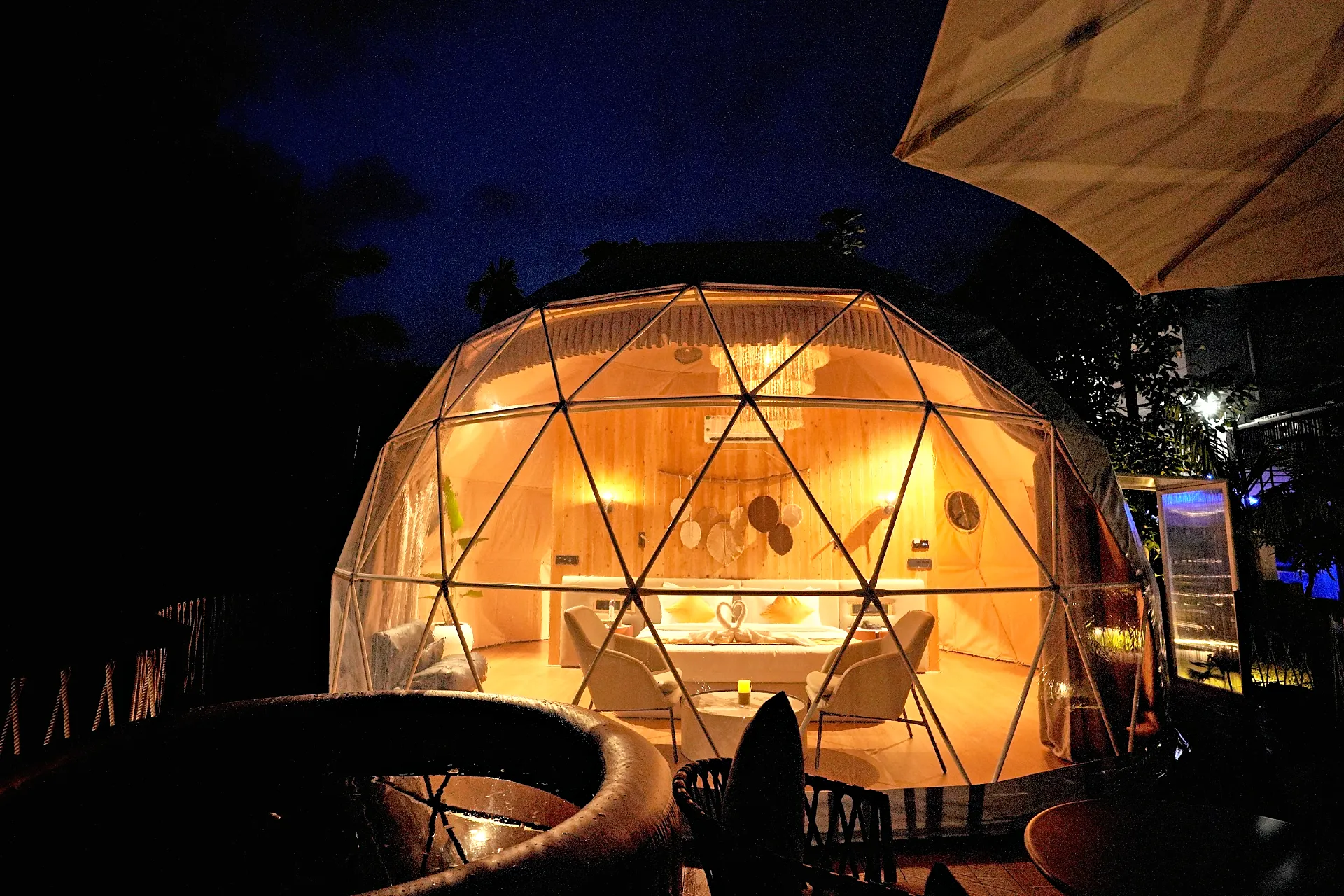 Glamping dome lit at night – Le Villagio Resort & Domes, Wayanad