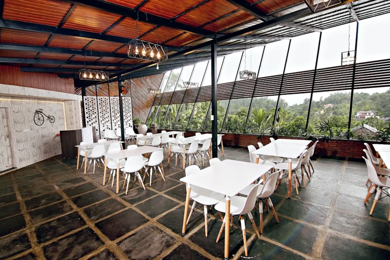 Restaurant dining tables – Le Villagio Resort & Domes, Wayanad