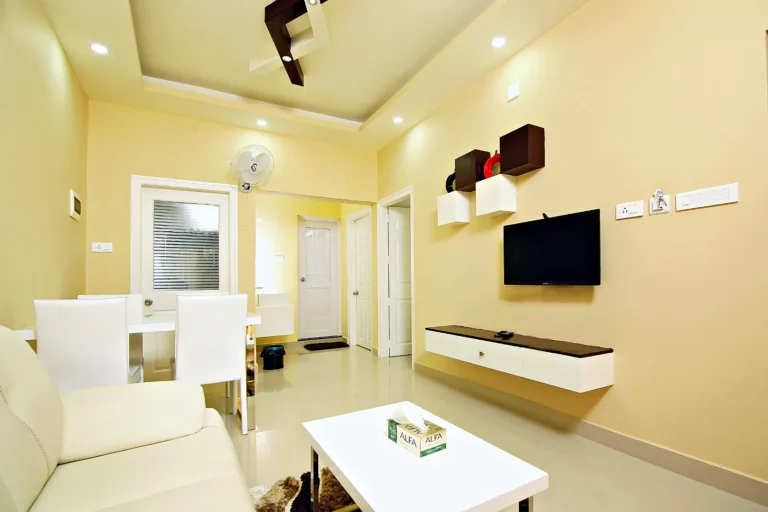 Living and dining room of a two-bedroom balcony apartment, Le Villagio Wayanad